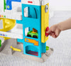 Fisher-Price Little People Toddler Toy Helpful NeighborÂs Garage Playset with Spiral Ramp and 2 Wheelies Cars for Ages 18+ Months