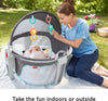 Fisher-Price Baby Portable Bassinet and Play Space On-the-Go Baby Dome with Developmental Toys and Canopy, Windmill