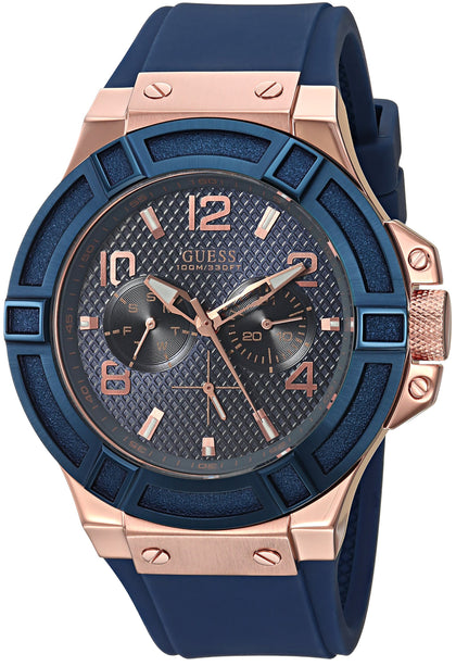 GUESS Men's Rigor Iconic Blue Stain Resistant Silicone Watch with Rose Gold-Tone Day + Date (Model: U0247G3)